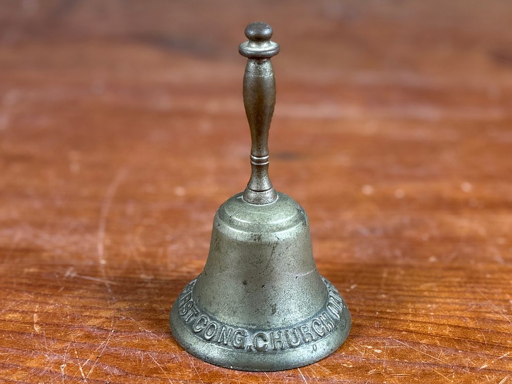 FIRST CONGREGATIONAL CHURCH, BRASS BELL. This lot features an early 20th century brass bell from 