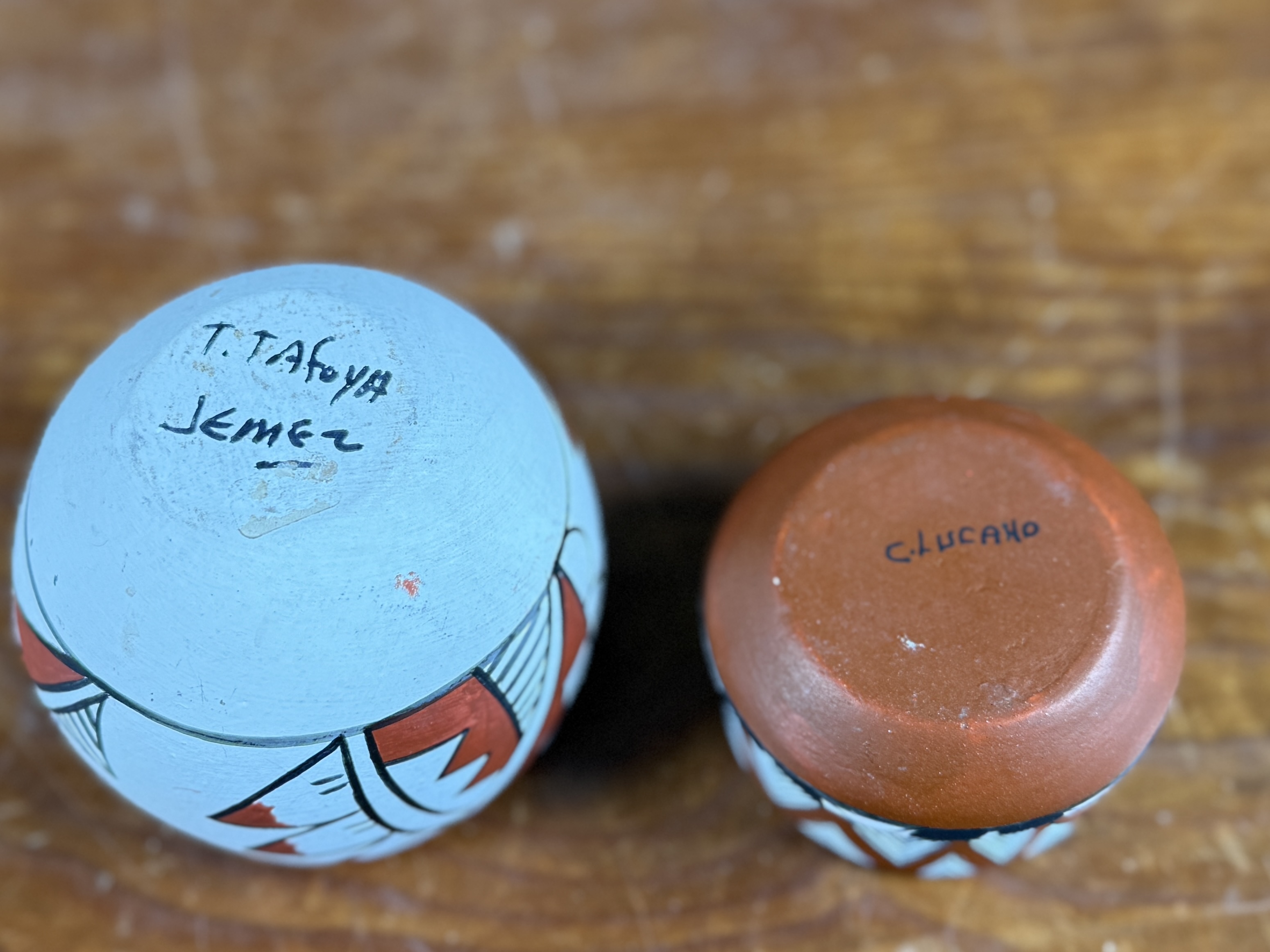 PAIR OF SIGNED NATIVE AMERICAN CLAY POTS