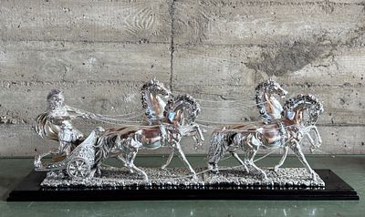 ROMAN CHARIOT SCULPTURE WITH LAMINATED SILVER. This lot features a Roman Chariot made in Italy 