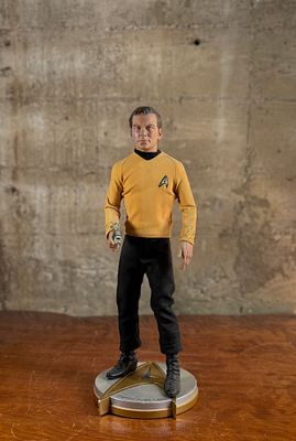 MAT FALLS FOR SIDESHOW COLLECTIBLES, CAPTAIN KIRK. This lot features a limited edition sculpture 