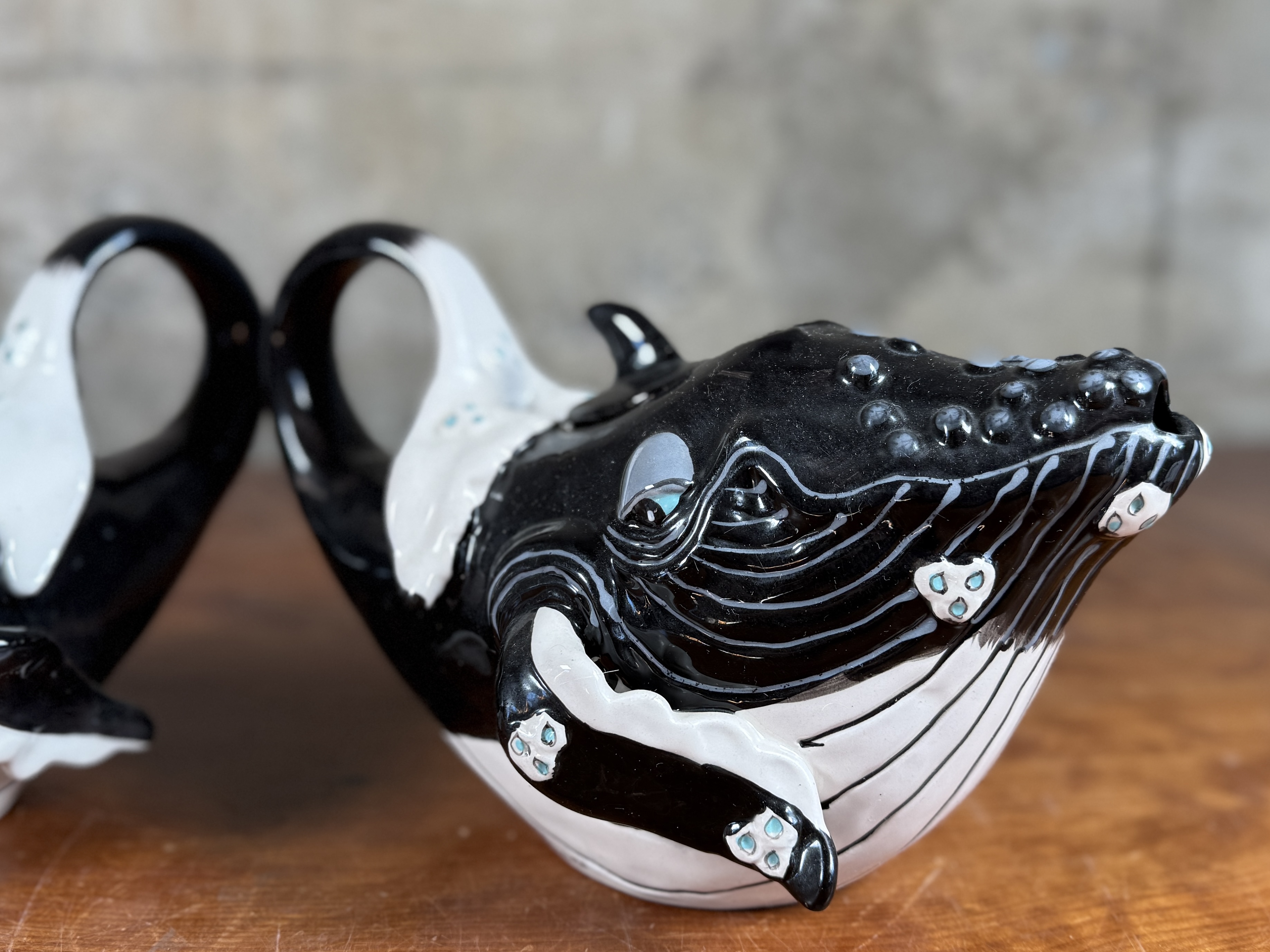 BLUE SKY CLAYWORKS, PAIR OF WHALE TEAPOTS