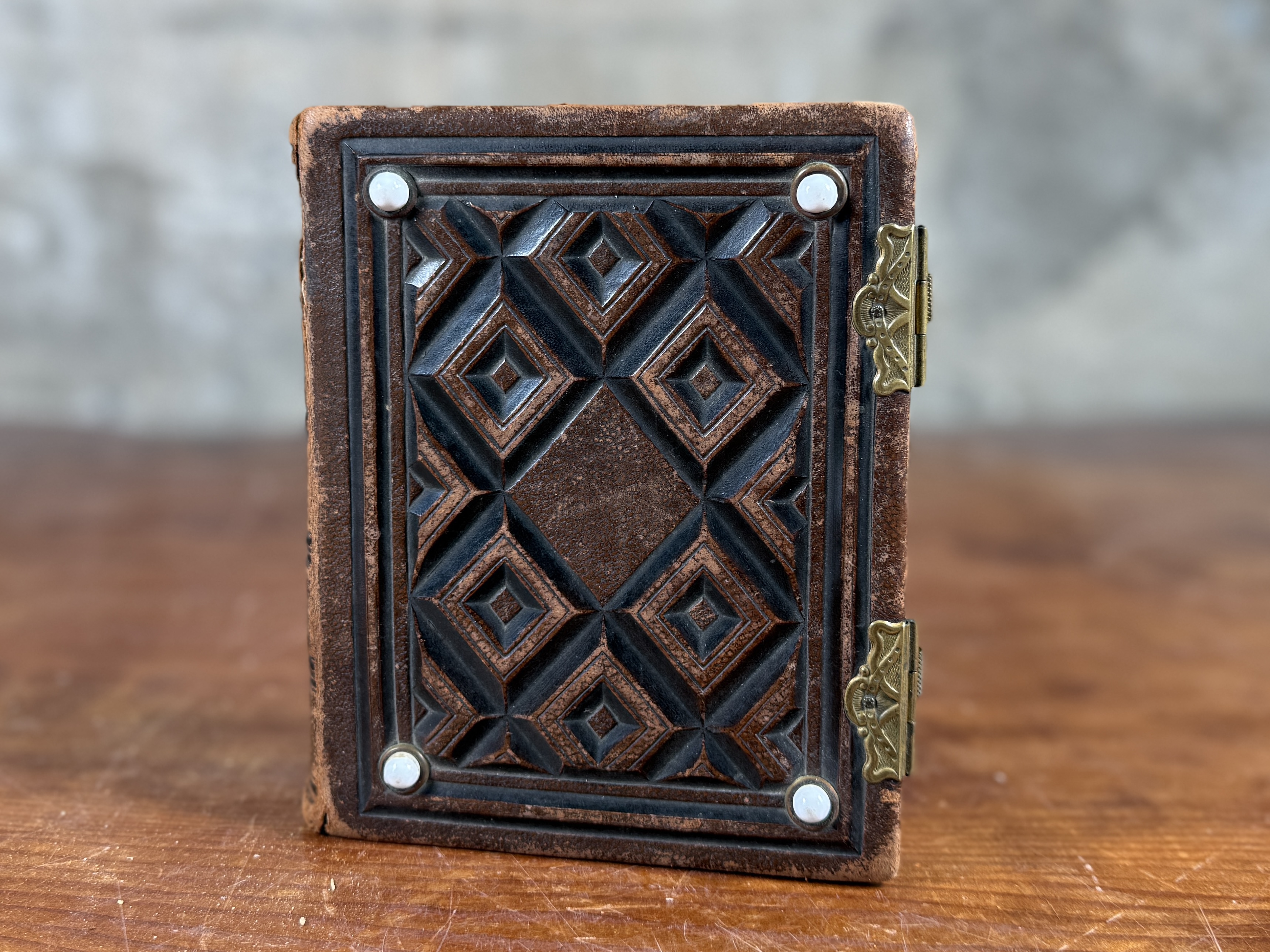 19TH CENTURY EMBOSSED LEATHER PHOTO ALBUM
