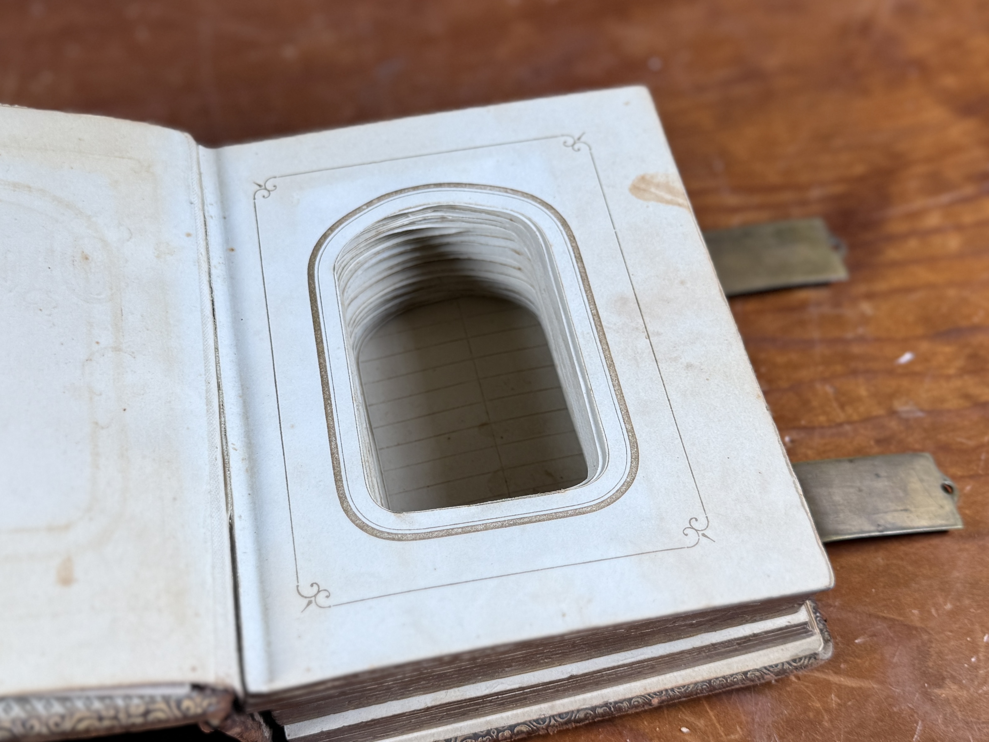 19TH CENTURY EMBOSSED LEATHER PHOTO ALBUM