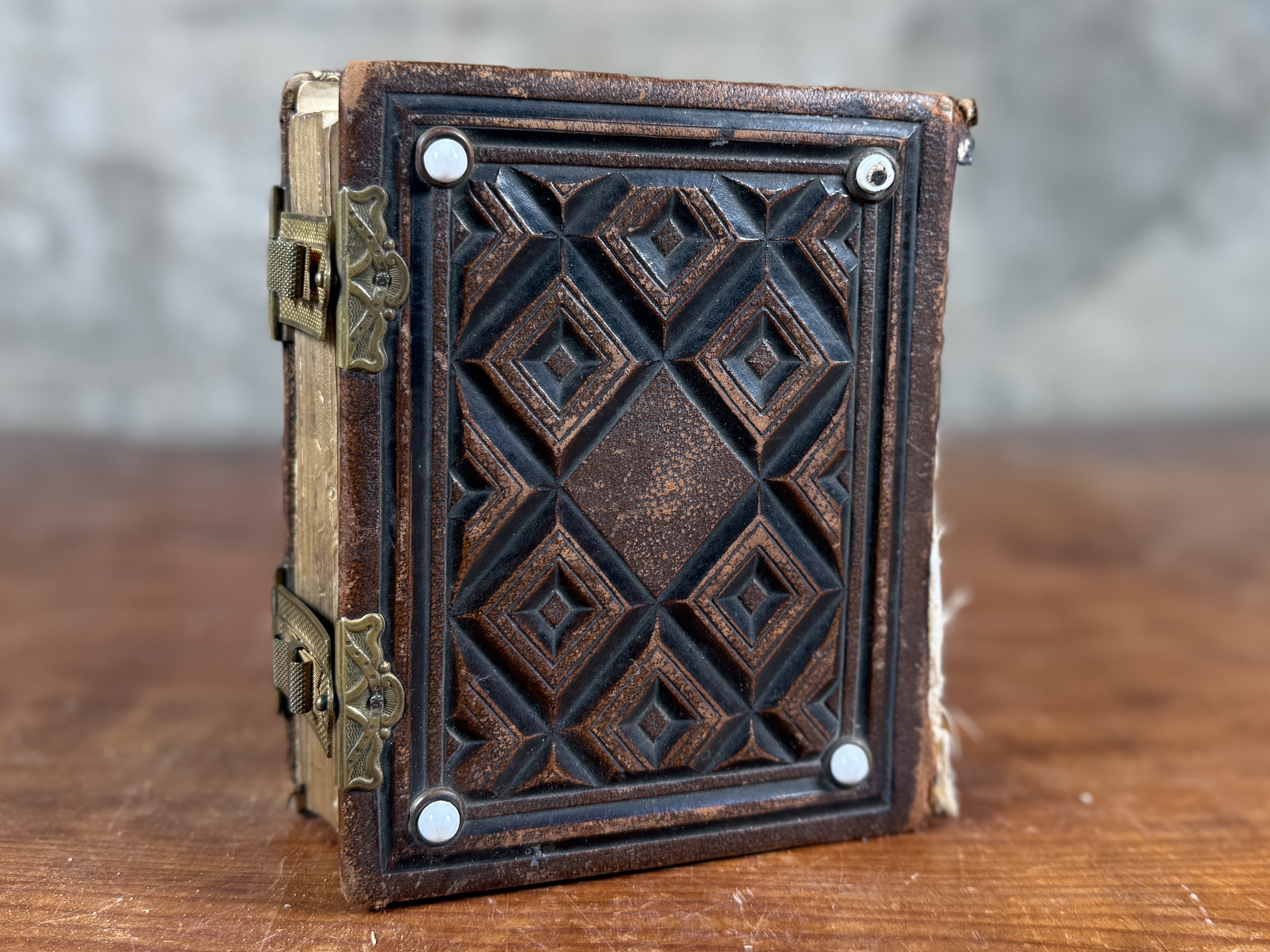 19TH CENTURY EMBOSSED LEATHER PHOTO ALBUM