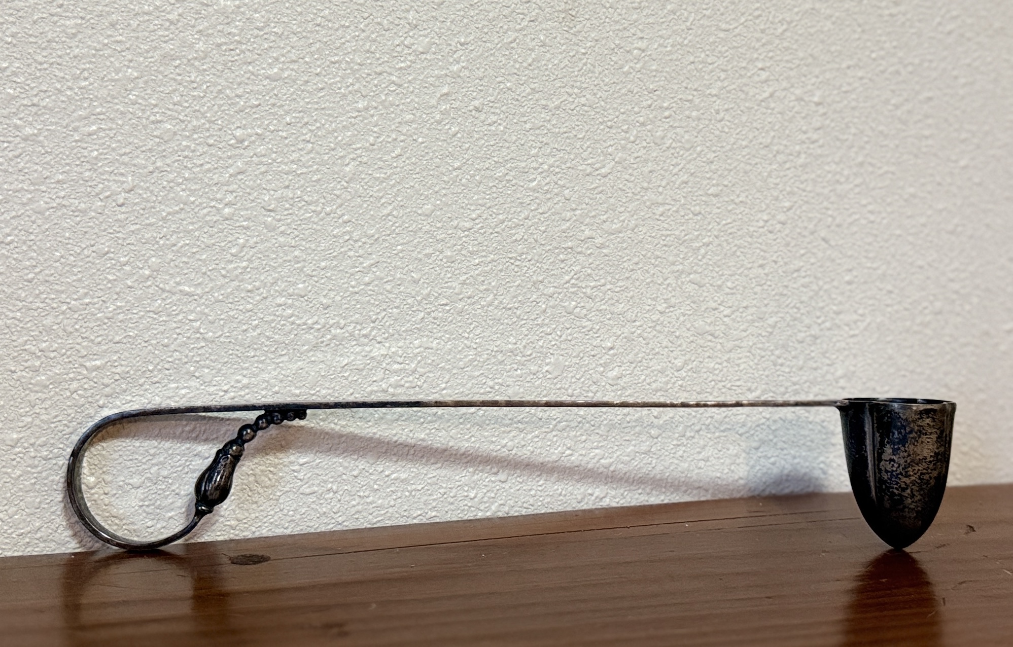 RANDAHL, STERLING SILVER CANDLE SNUFFER