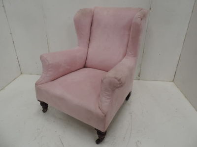 19th Century Over Stuffed Upholstered Howard Style Armchair on Short Turned Legs with Casters