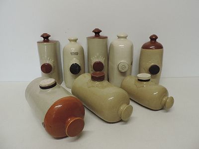 Eight 19th Century Stone Hotwater Bottles with Stoppers