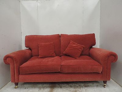 Terracotta Upholstered Two Seater Settee with Back Cushions on Turned Legs with Brass Casters