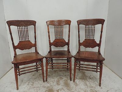 Set of Three Early 20th Century American Bobbin Back Solid Seat Dining Chairs
