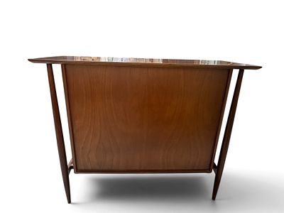 Mid Century Modern Bar With Floating Design. Mid century modern bar featuring a floating design 