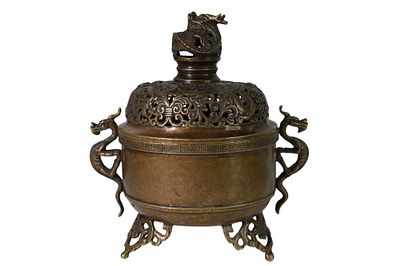 Chinese Bronze Dragon-Handled Covered Censer. Chinese bronze covered censer of archaistic design 