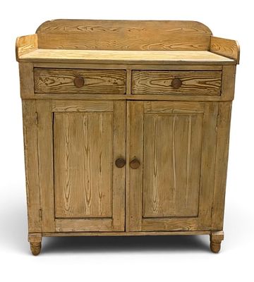 Antiquie Jelly Cupboard (Circa 1840). Oak cupboard featuring a backsplash and two upper drawers 