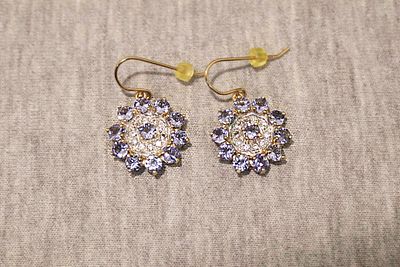 Ohrringe. 375 yellow gold; 6.4g; in star shape; blue and white glass stones