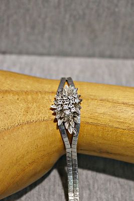 Vintage Silberarmband mit aufgesetzter Bl&uuml;te und echten Zirkonen. Silver bracelet, 19.0g, 925 