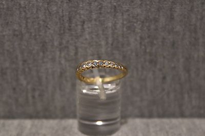 Halbmemoryring. Half-eternity ring with diamonds, 18K yellow gold; 2.5g; triangular design, ring 