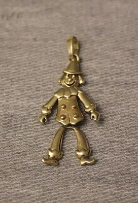 Harlequin pendant, 14 karat yellow gold, movable. Harlequin pendant, 14 karat; 2.7g, movable 