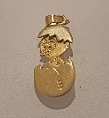 "Calimero" pendant, 14 karat. 14-karat gold "Calimero" pendant. The eggshells are movable. In 