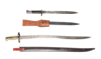 Two Bayonets w/ Scabbards. Two antique bayonets, the largest is a 28" L French bayonet with 