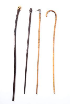 Four Antique Gentleman's Canes. Collection of four gentleman's canes including a silvered 