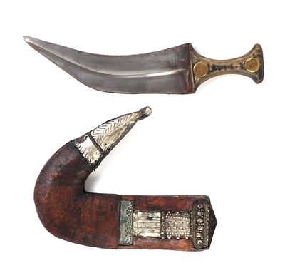 Jambiya Dagger with Ornately Decorated Scabbard. Jambiya dagger with decorated sheath 