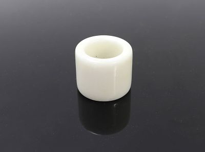 Chinese White Jade Style Archers Ring. Handsomely carved white jade style Chinese archers ring. 