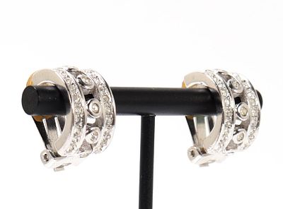 Lovely Chr. Dior Rhinestone Clip-On Earrings. Vintage Christian Dior clip-on earrings with clear 