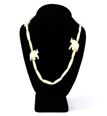 Stylish Bone Style Carved Elephant Necklace. Lovely necklace comprised of bone style carved tube 