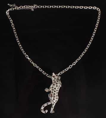 Cartier Style Silver Leopard Pendant. Beautiful silver jaguar pendant with emerald colored eyes 