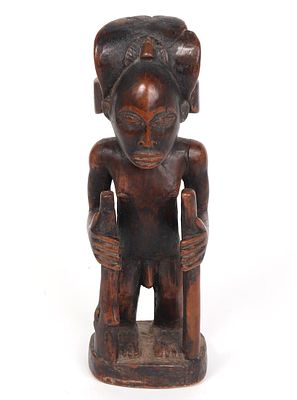Chief Figure 'Mwanangana' Chokwe, circa 1900. Finely carved early chief figure in wood known as 