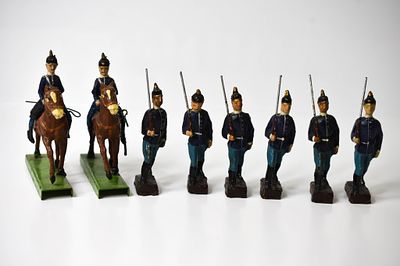 8 Composition German Soldiers. 1 horse is missing the sword. 1 of the riders has a taped back 