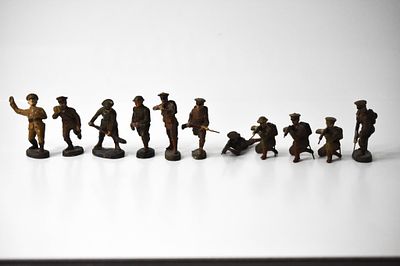 11 Elastolin WWI British American Soldiers. Composition. Officer falling backwards after getting 