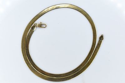 14K Yellow gold Necklace 14.58G. Herringbone designed 14k yellow gold necklace. This item 
