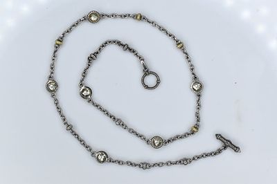 18K Gold and Sterling Necklace 13.62G. A nice sterling silver and 18K gold necklace with crystal 