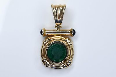 14K Gold Pendant 7.05g. 14K Gold Pendant measuring approximately 1.5" in diameter and weighs 