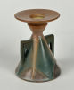 Roseville Aztec Lady Candle Holder. Marked 4"T x 3.35" W Good condition no chips or cracks seen.Image - 2
