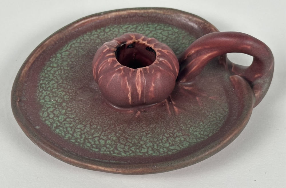 Rookwood #1067 Candle Holder. Width: 5.5"
Note: hairline crack at base not visible at top