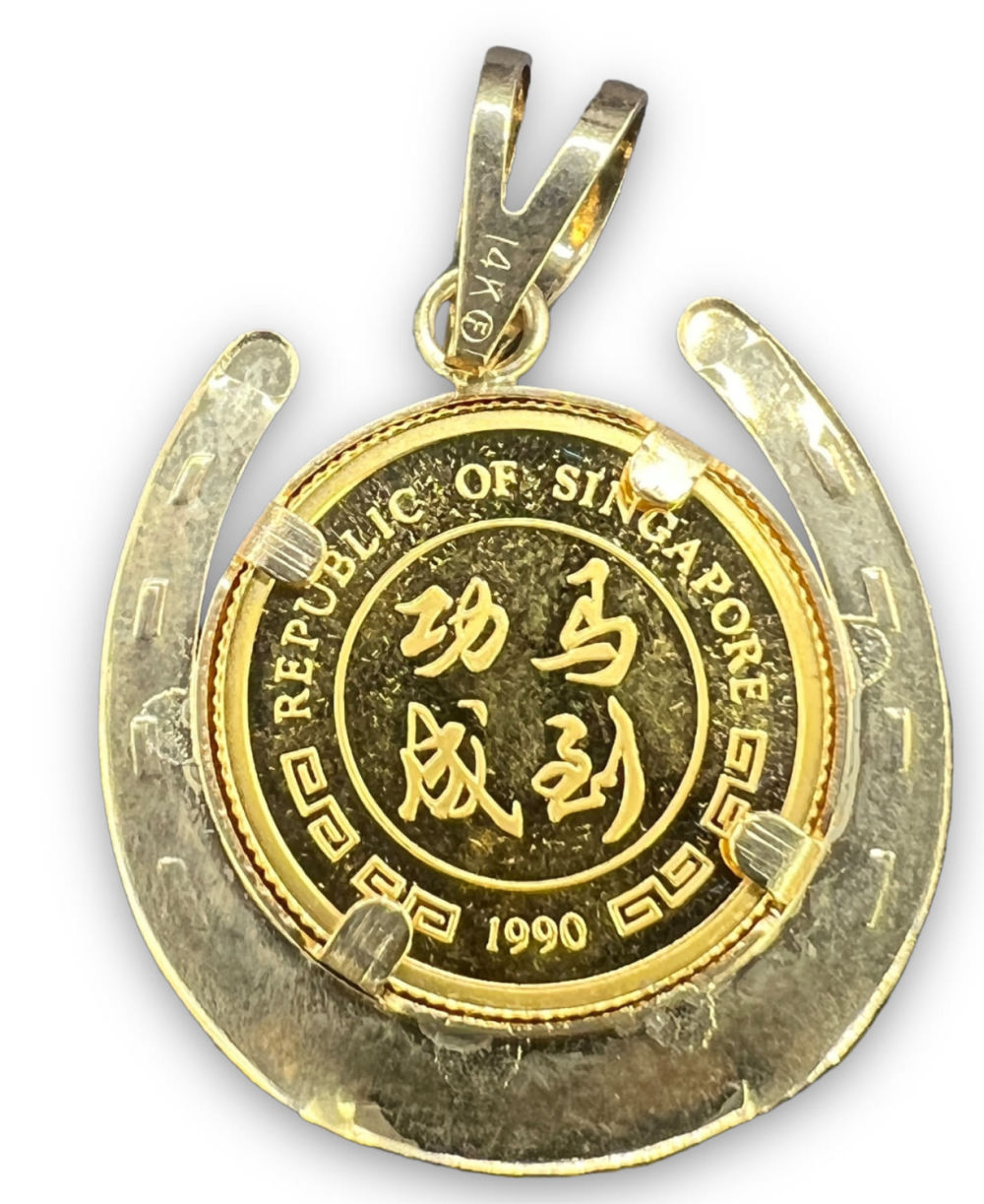 1990 Singapore1/20oz Coin In 14k Gold Bezel. Weight: 2.53g Diameter: 19.3mm