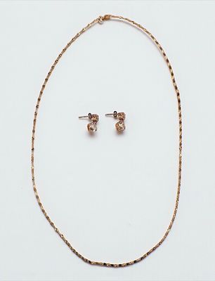 10K Rose Gold Necklace W/ 10K Rose Gold Earrings. Length Of Necklace: 19" 
Total Weight: 3g 
