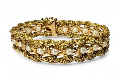 14K Gold Braided Bracelet with Cultured Pearls. Size: 7 
Box clasp with a figure eight safety 