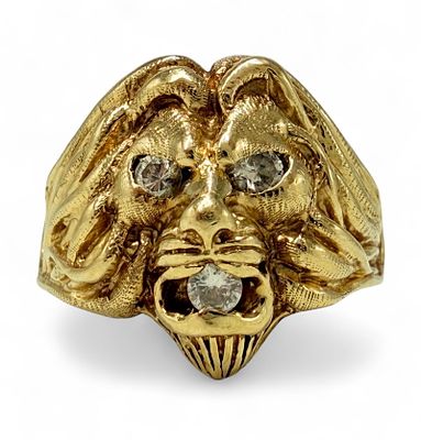 Diamond and 14K Yellow Gold Lion Ring. Features three round diamonds, each measuring 