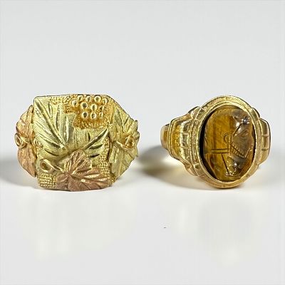 (2) 10K Gold Men's Ring. (1) Tri-Color Black Hills Gold and (1) Yellow Gold with stone 
Size: 