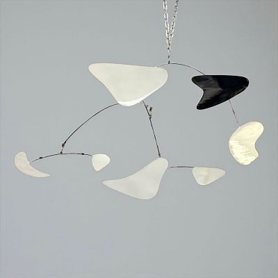 After Alexander Calder Mobile. Overall Length:30" 
Overall Width: 47" 
Condition: The mobile 