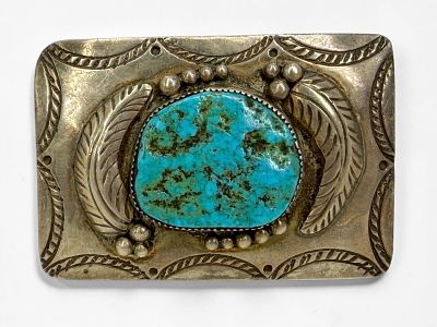 Alice Benally Silver & Turquoise Belt Buckle. Stamped on the reverse. 
Dimensions: 3" x 2" 