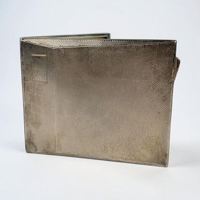 Sterling Cigarette Case. Dimensions: 4" x 3 1/4" 
Total Weight: 4.38ozt 
Condition: Tarnishing 