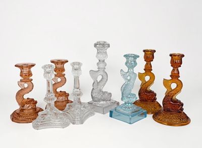 (8) "Dolphin" Glass Candlesticks. Includes candlesticks from Fenton, Cambridge Glass Co., and 