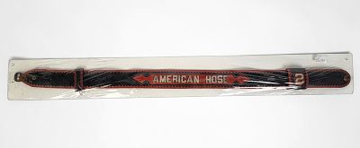 Antique American Hose Firemans Parade Belt. Dimensions: 42" long x 2 1/2" wide 
Condition: Wear 