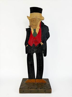Folk Art Butler Ashtray (As Is). Dimensions: 27" x 10 1/4" x 9" 
Condition: The ashtray from the 
