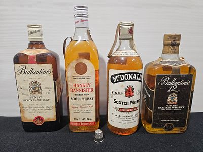 4 garrafas de whisky diversas