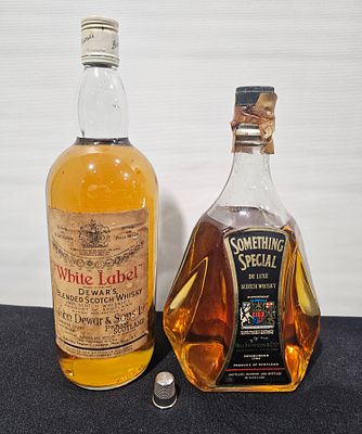 2 garrafas de whisky de 1 litro de white label e something special