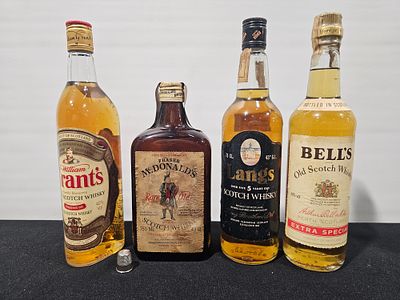 4 garrafas de whisky diversas
